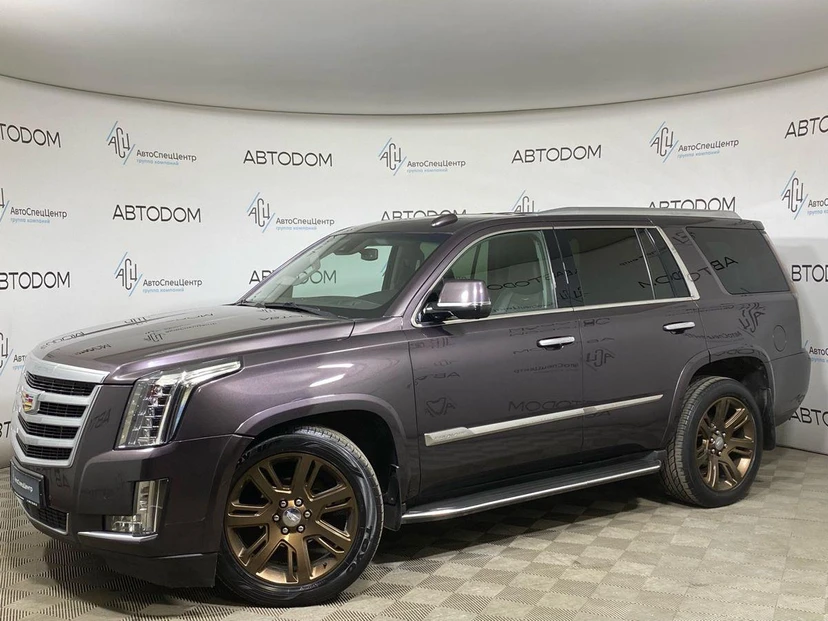 Cadillac Escalade IV поколение 6.2 AT 4WD (409 л.с.) Premium Коричневый 2015 с пробегом 214 304 км