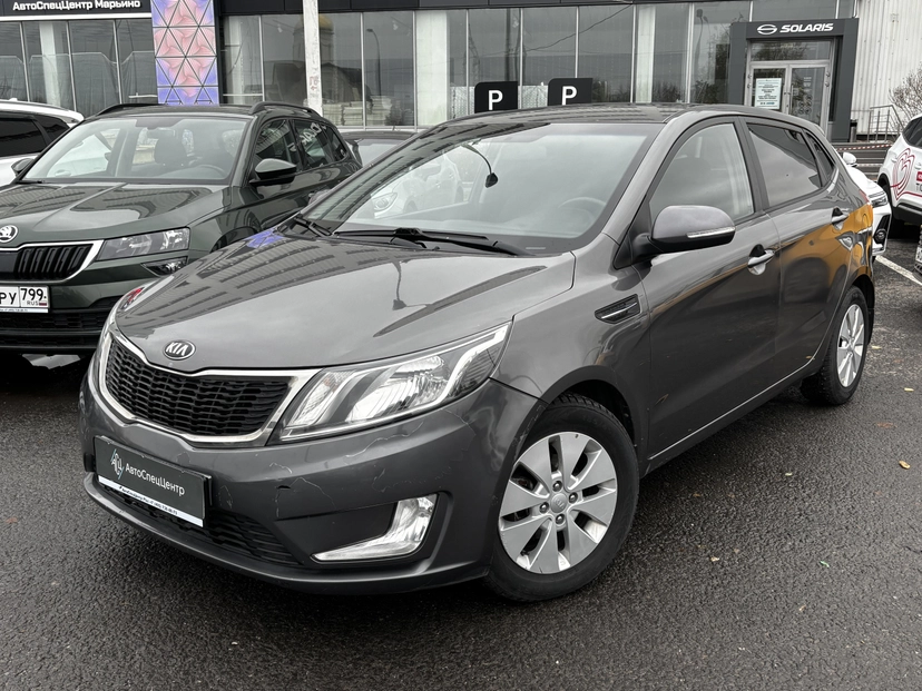 Автомобиль Kia Rio III поколение 1.6 4AT (123 л.с.) Prestige Серый 2013 с пробегом 139 000 км