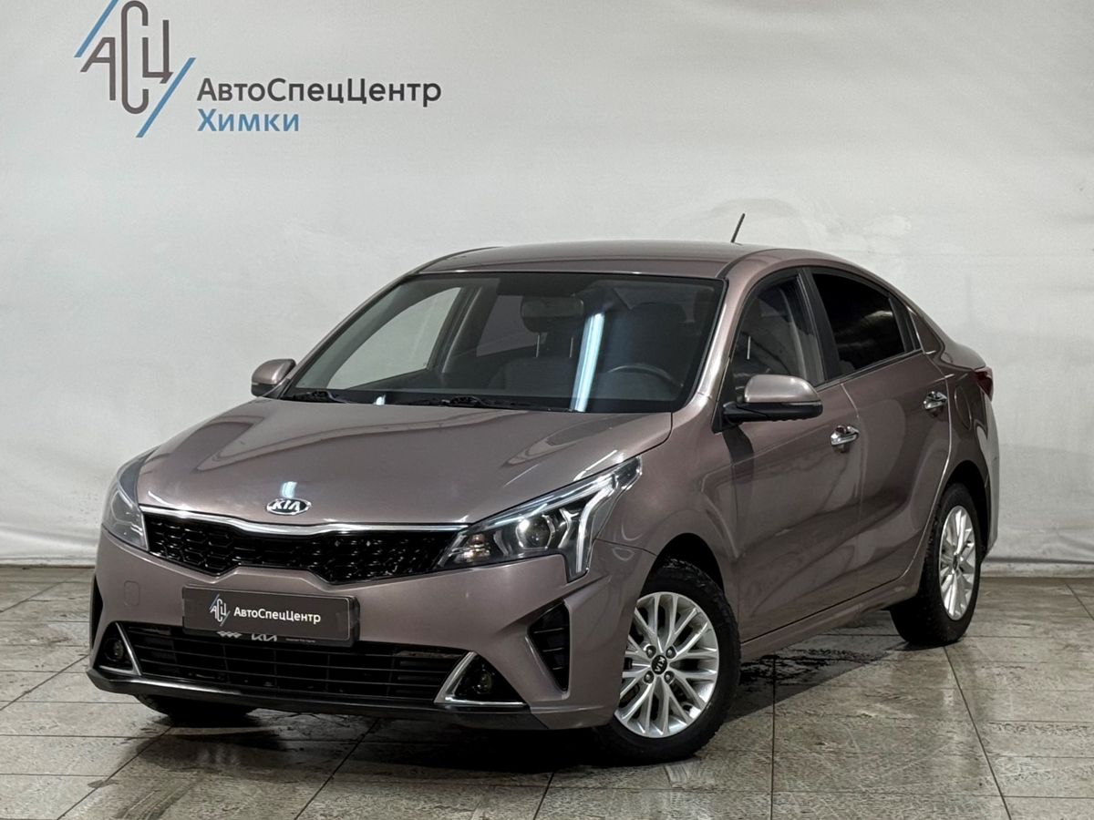 Автомобиль Kia Rio IV [рестайлинг] 1.6 AT (123 л.с.) Prestige Коричневый 2021 с пробегом 110 000 км