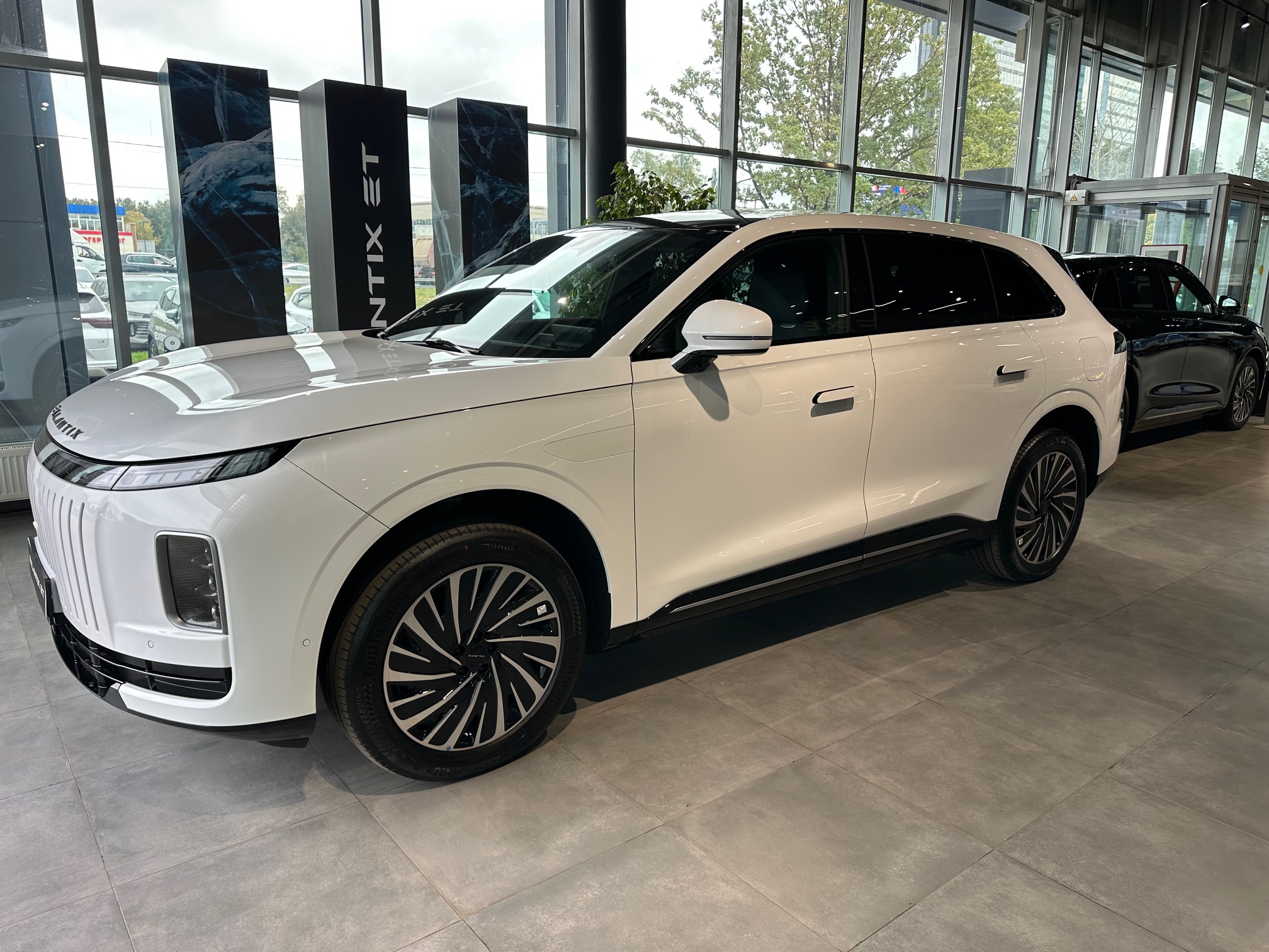 Автомобиль EXEED EXLANTIX ET I поколение 1.5hyb AT 4WD (469 л.с.) Top Белый 2025 новый