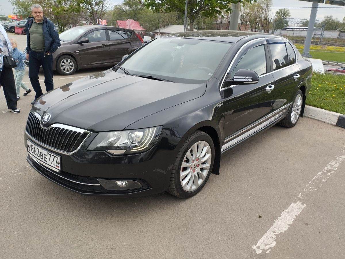 Skoda Superb II [рестайлинг] 2.0 AMT (200 л.с.) Elegance Чёрный 2014 с пробегом 79 732 км