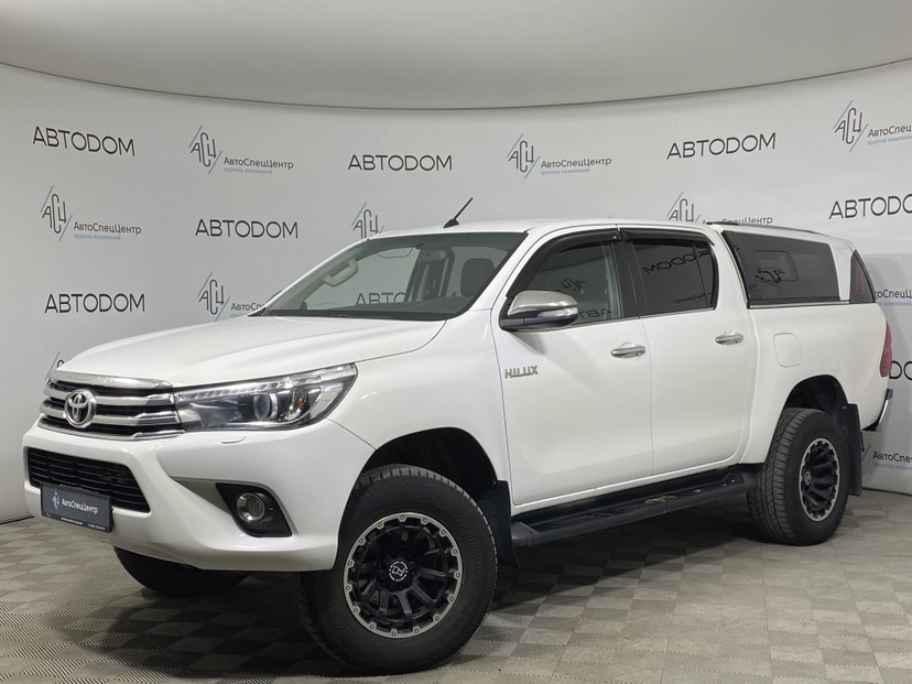 Автомобиль Toyota Hilux VIII поколение 2.8d AT 4WD (177 л.с.) Exclusive Белый 2015 с пробегом 218 290 км