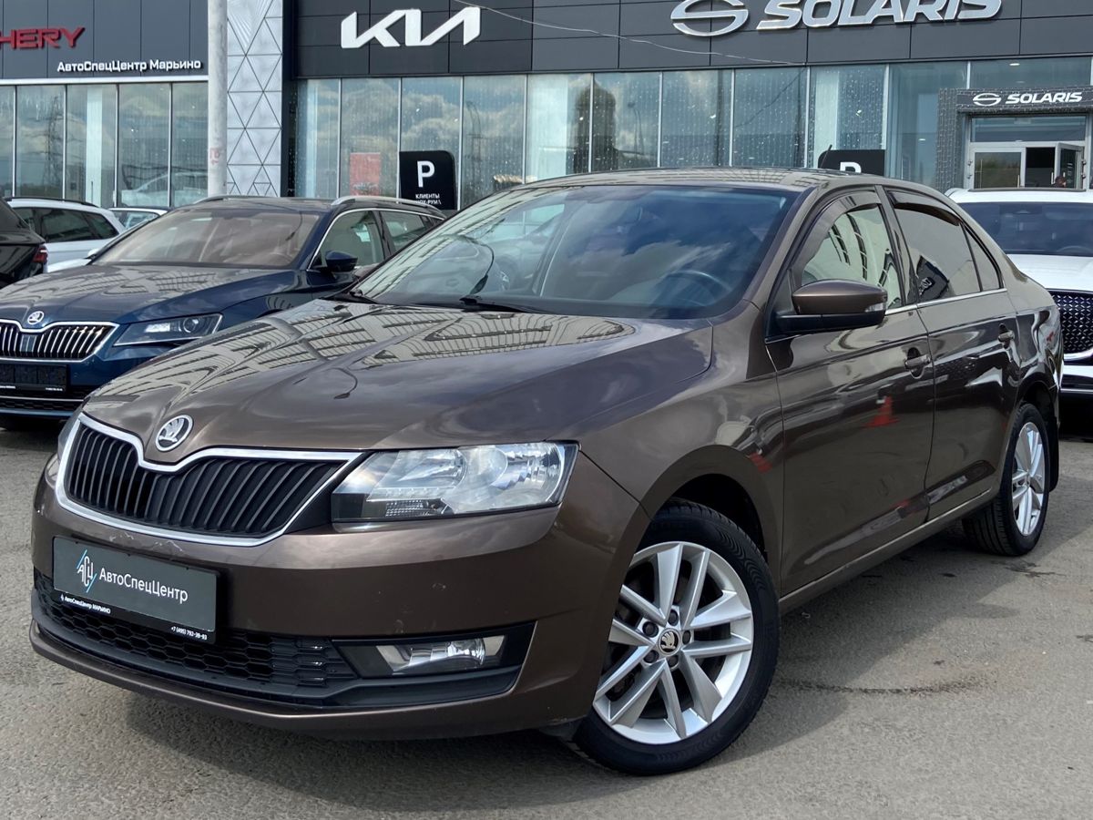 Автомобиль Skoda Rapid I [рестайлинг] 1.6 AT (110 л.с.) Ambition Коричневый 2017 с пробегом 145 000 км
