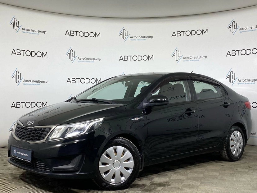 Автомобиль Kia Rio III поколение 1.4 AT (107 л.с.) Comfort Чёрный 2012 с пробегом 156 237 км
