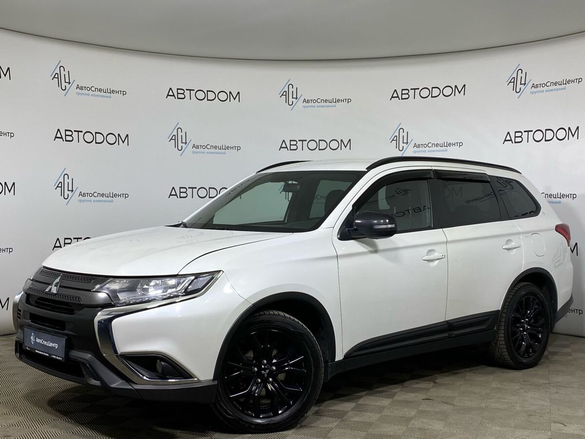 Автомобиль Mitsubishi Outlander III [3-й рестайлинг] 2.0 CVT 4WD (146 л.с.) Base Белый 2021 с пробегом 128 276 км