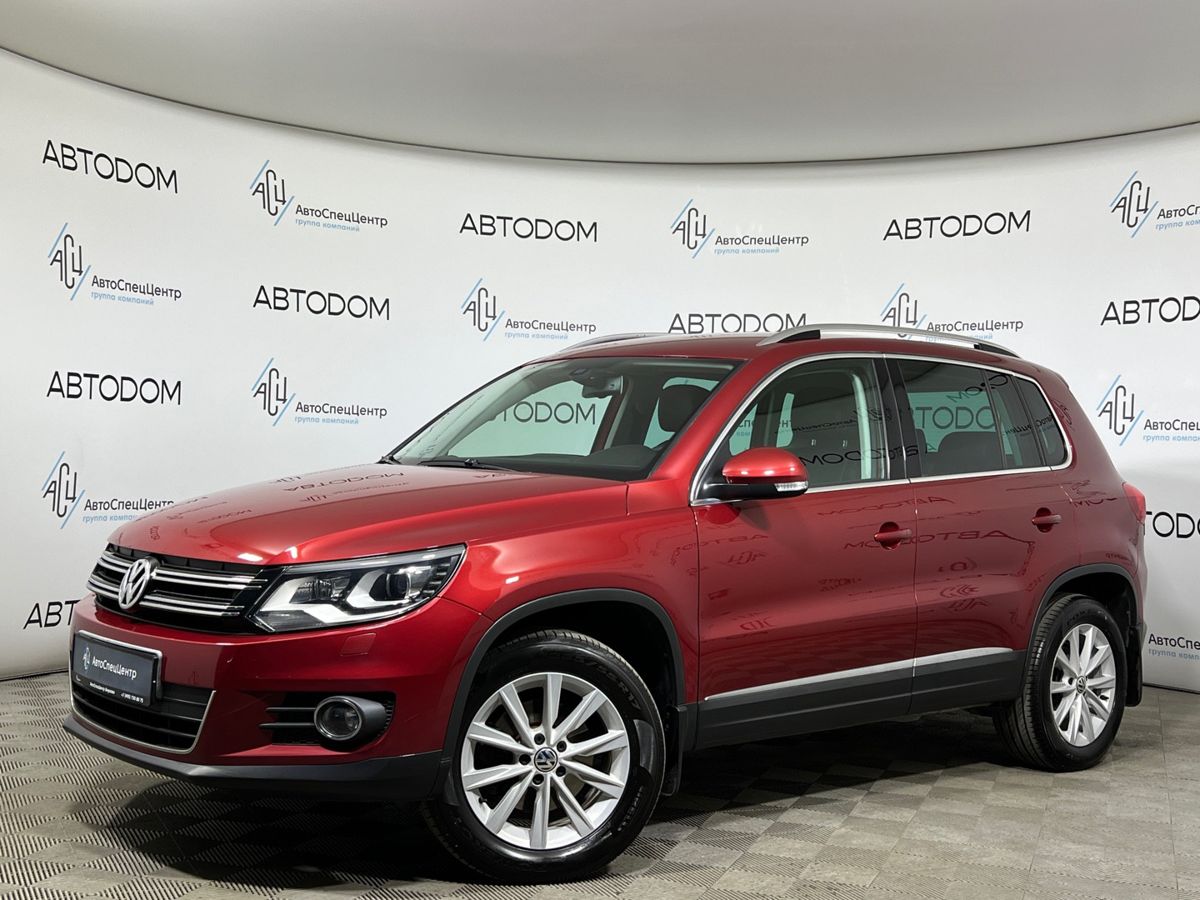 Volkswagen Tiguan I [рестайлинг] 2.0 AT 4WD (200 л.с.) Adventure Красный 2011 с пробегом 249 919 км