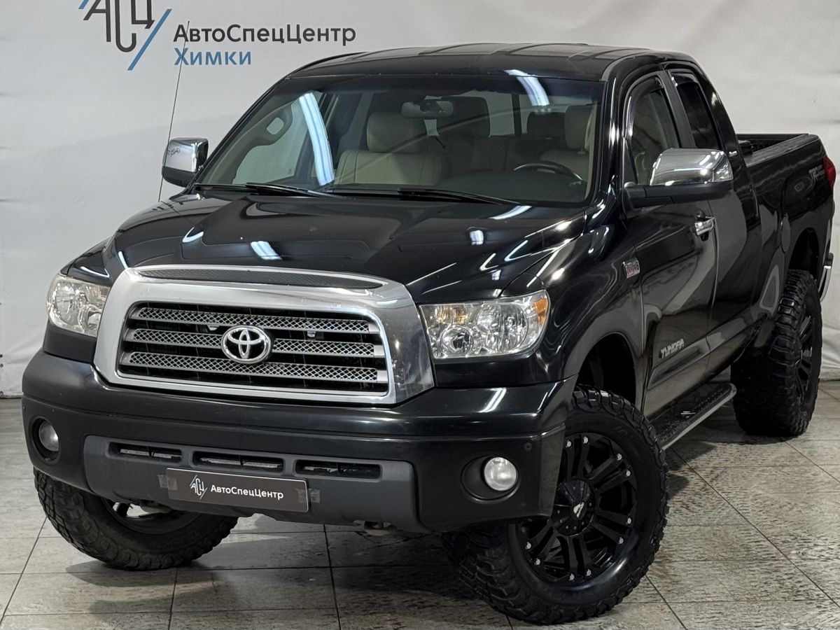 Автомобиль Toyota Tundra II поколение 5.7 AT 4WD (381 л.с.) Base Чёрный 2007 с пробегом 149 000 км