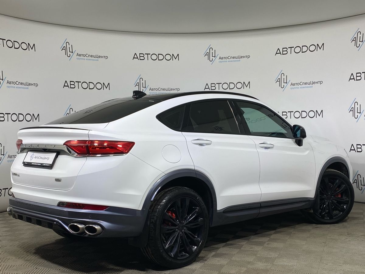 Автомобиль Geely Tugella I [рестайлинг] 2.0 AT 4WD (238 л.с.) Flagship Sport Белый 2023 с пробегом 68 018 км