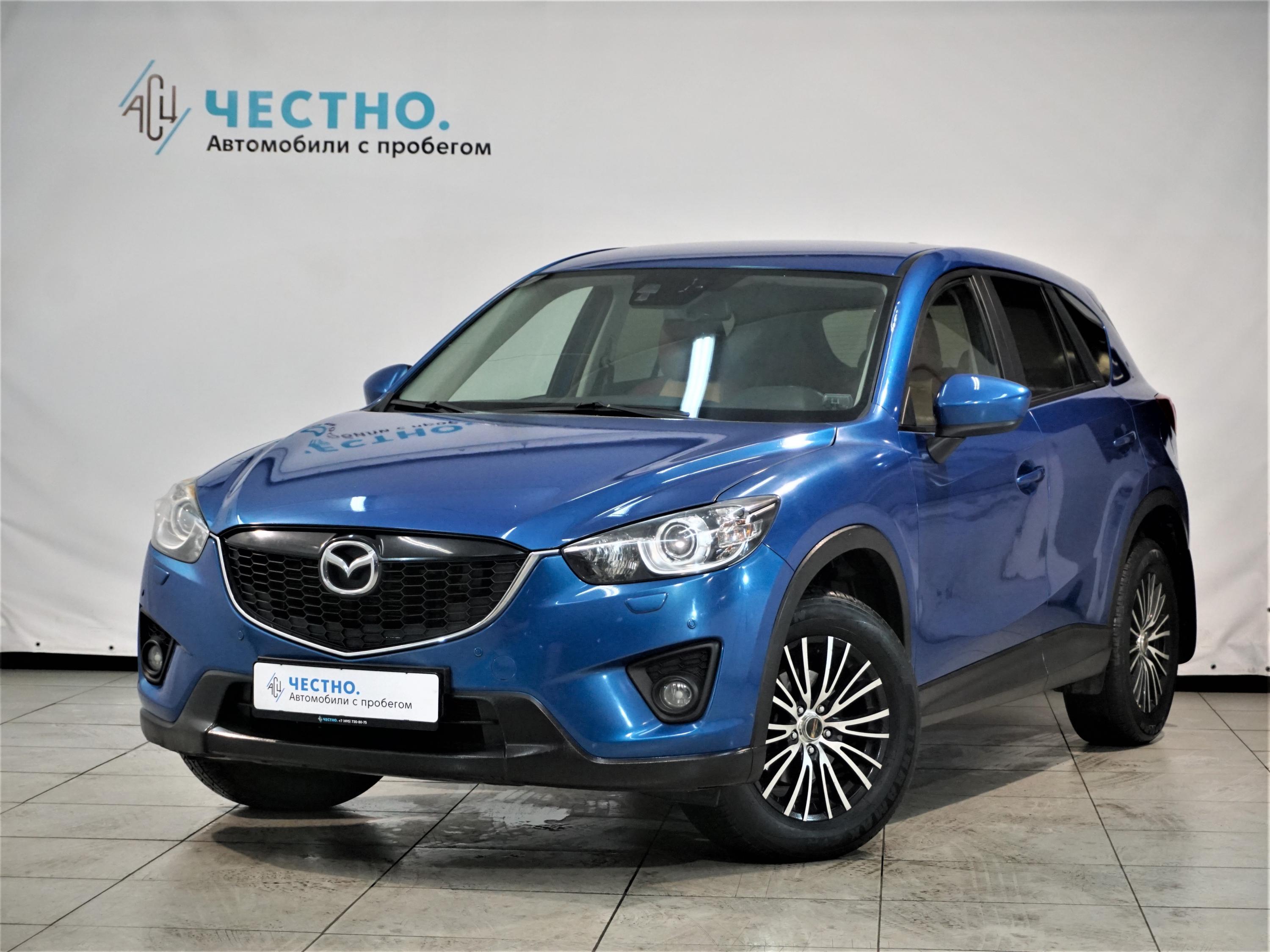 Автомобиль Mazda CX-5 I поколение 2.0 AT 4WD (150 л.с.) Drive Синий 2012 с пробегом 125357 км