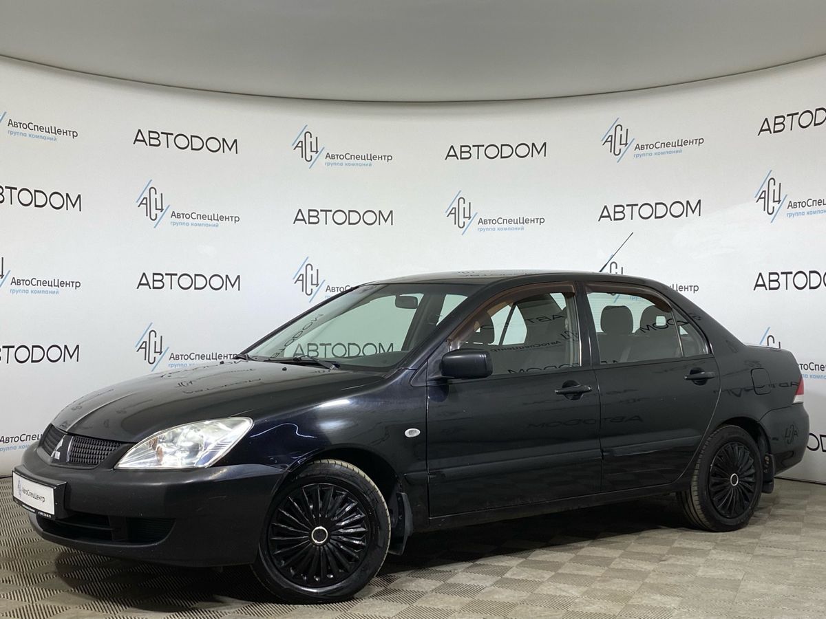 Mitsubishi Lancer IX [рестайлинг] 1.6 AT (98 л.с.) Base Чёрный 2007 с пробегом 219 036 км