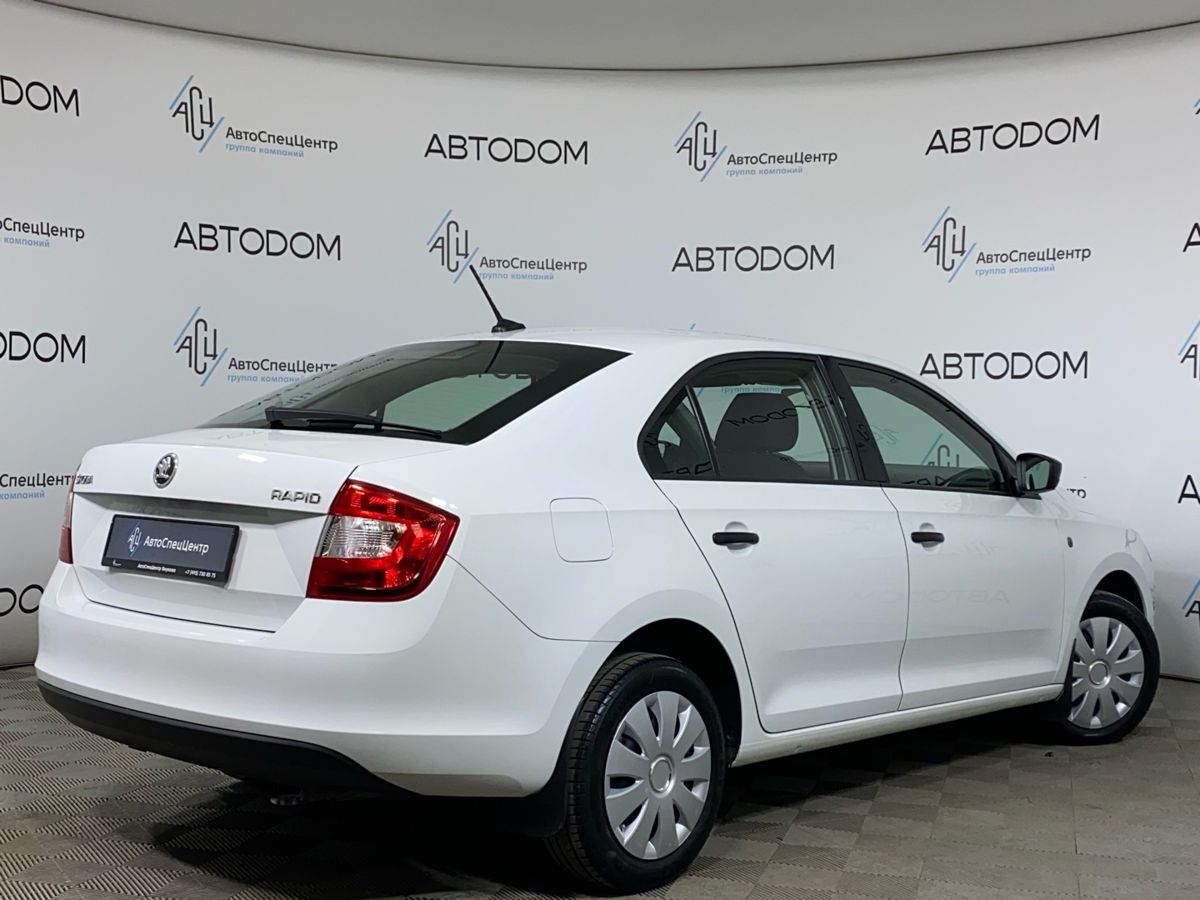 Автомобиль Skoda Rapid I поколение 1.6 AT (110 л.с.) Active Белый 2017 с пробегом 76 823 км