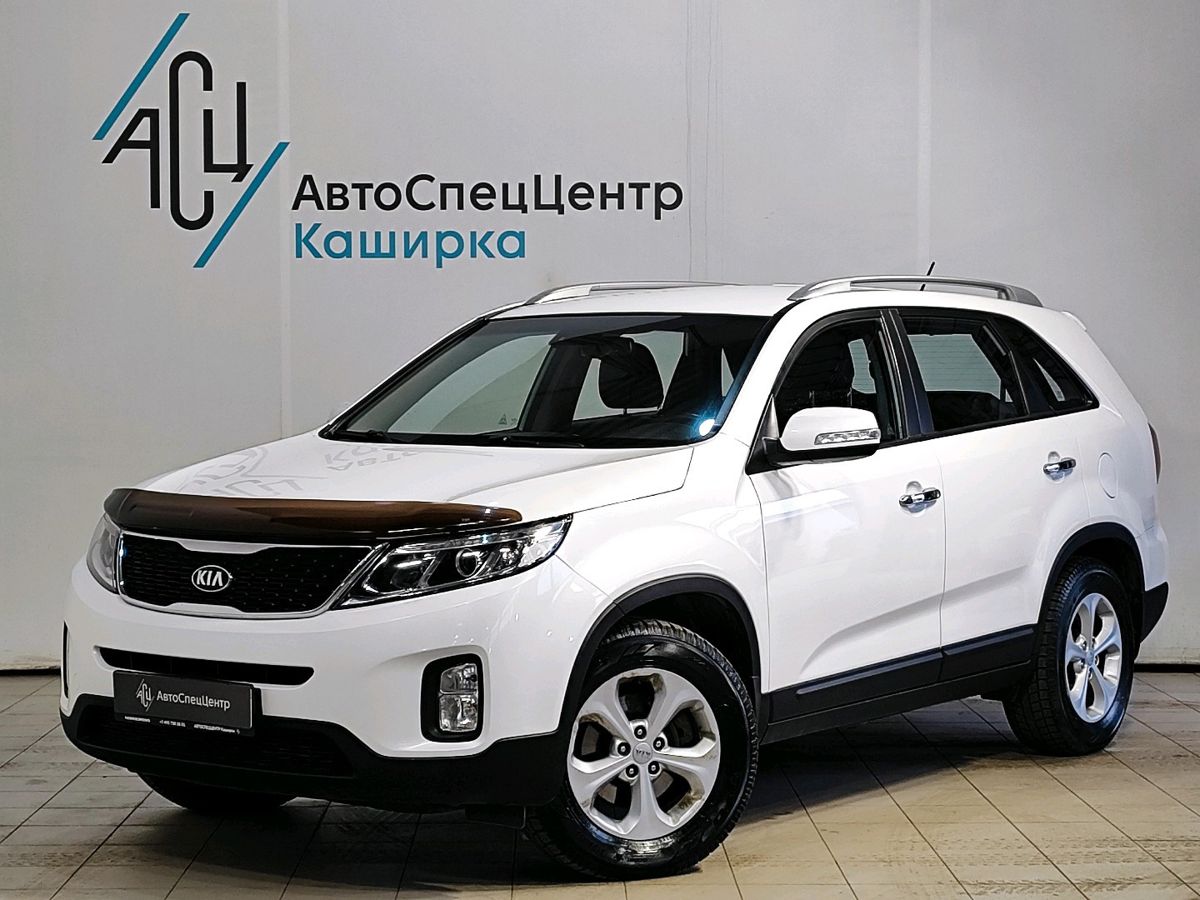 Автомобиль Kia Sorento II [рестайлинг] 2.4 AT 4WD (175 л.с.) Luxe Белый 2016 с пробегом 169 962 км