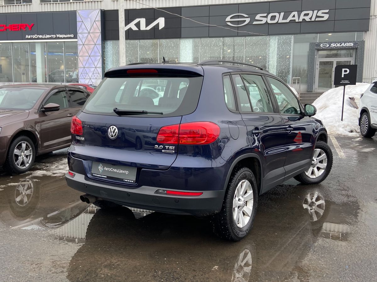 Автомобиль Volkswagen Tiguan I [рестайлинг] 2.0 AT 4WD (170 л.с.) Track & Field Синий 2013 с пробегом 50 240 км