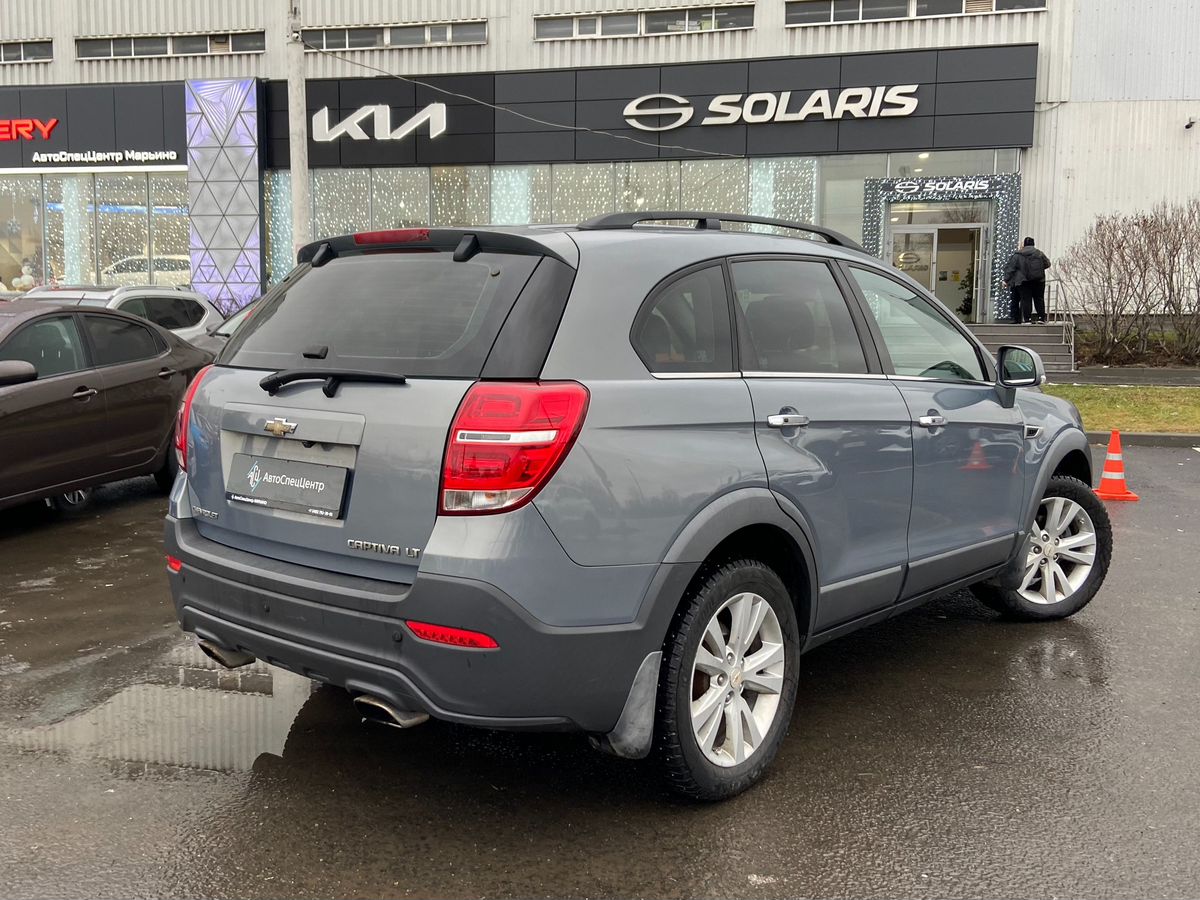 Автомобиль Chevrolet Captiva I [2-й рестайлинг] 2.2d AT 4WD (5 мест) (184 л.с.) LT+ Серый 2013 с пробегом 167 000 км