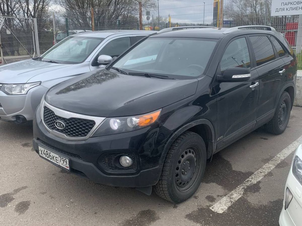 Автомобиль Kia Sorento II поколение 2.4 AT 4WD (175 л.с.) Comfort Чёрный 2012 с пробегом 176 086 км