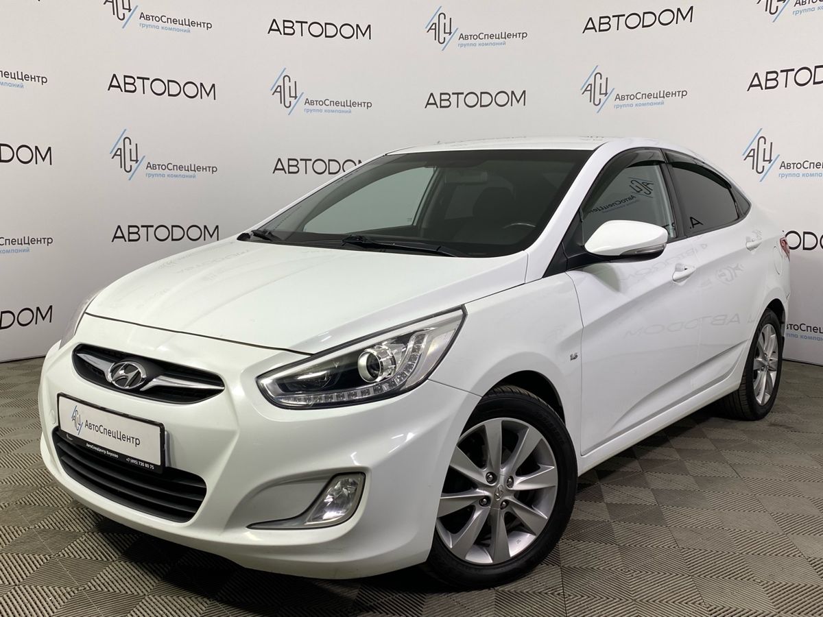Автомобиль Hyundai Solaris I поколение 1.6 MT (123 л.с.) Comfort Белый 2014 с пробегом 211 460 км