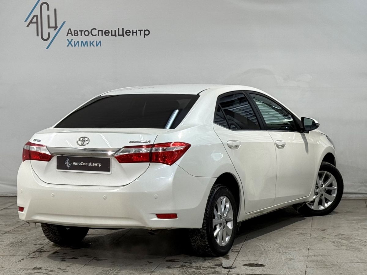 Автомобиль Toyota Corolla XI (E160/E170) 1.6 CVT (122 л.с.) Стиль Плюс Белый 2013 с пробегом 167 000 км