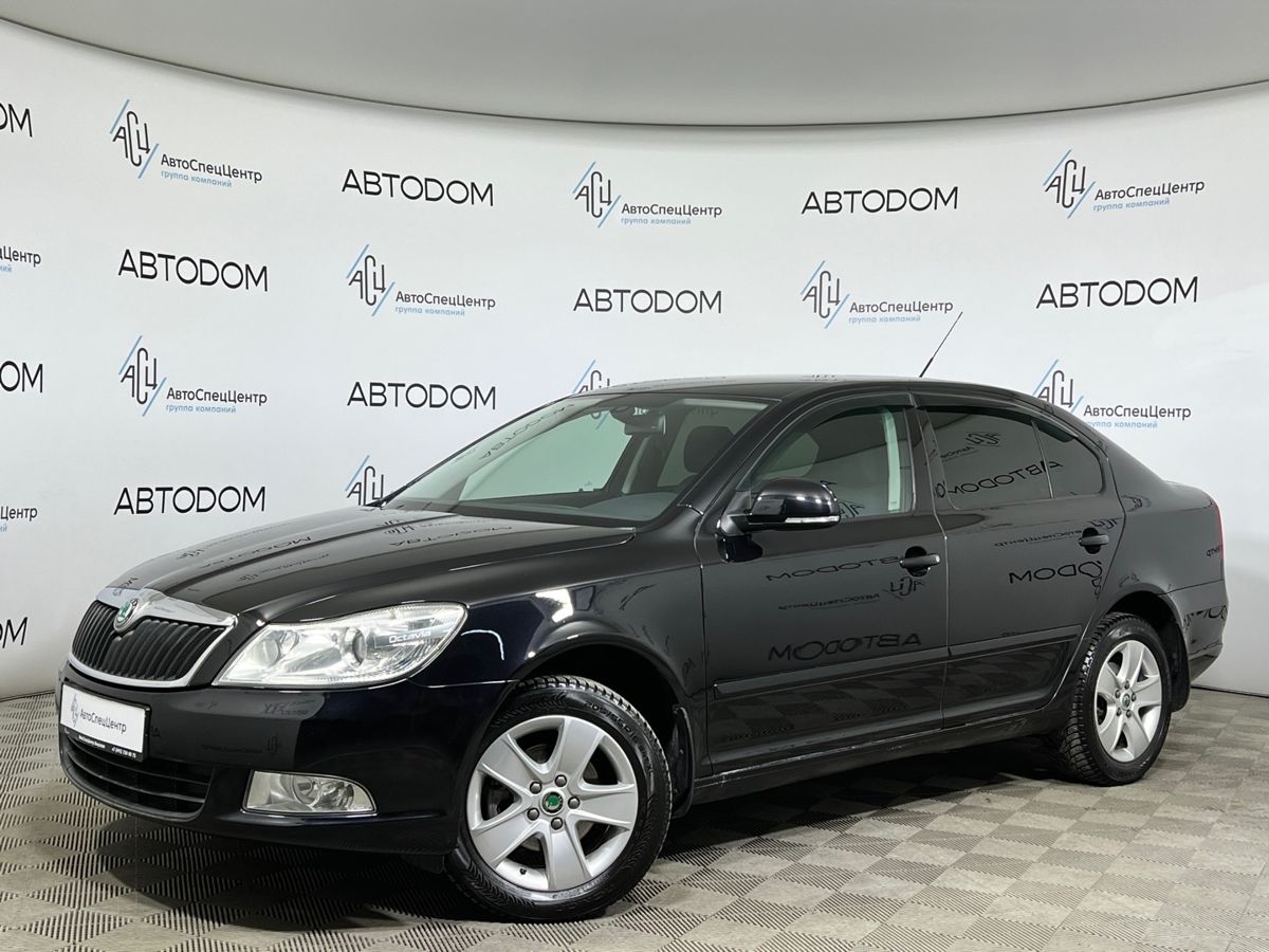Автомобиль Skoda Octavia II (A5) [рестайлинг] 1.4 MT (122 л.с.) Ambition Чёрный 2012 с пробегом 166 221 км