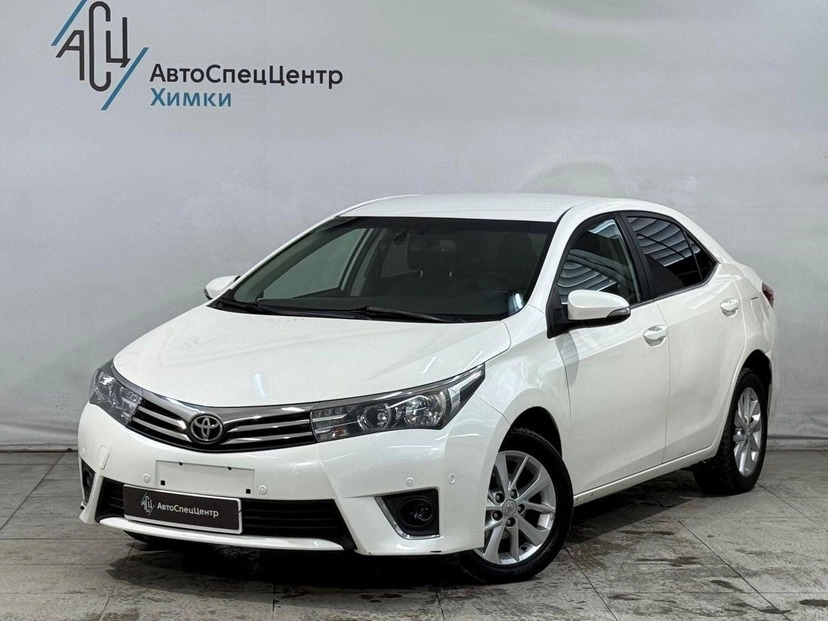 Автомобиль Toyota Corolla XI (E160/E170) 1.6 CVT (122 л.с.) Стиль Плюс Белый 2013 с пробегом 167 000 км