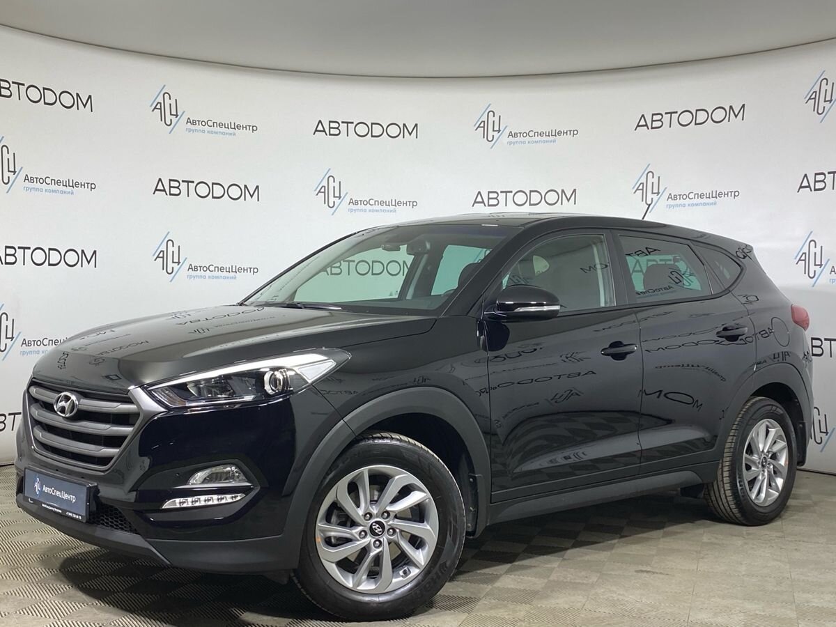 Автомобиль Hyundai Tucson III поколение 1.6 AMT 4WD (177 л.с.) Lifestyle Чёрный 2016 с пробегом 21 355 км