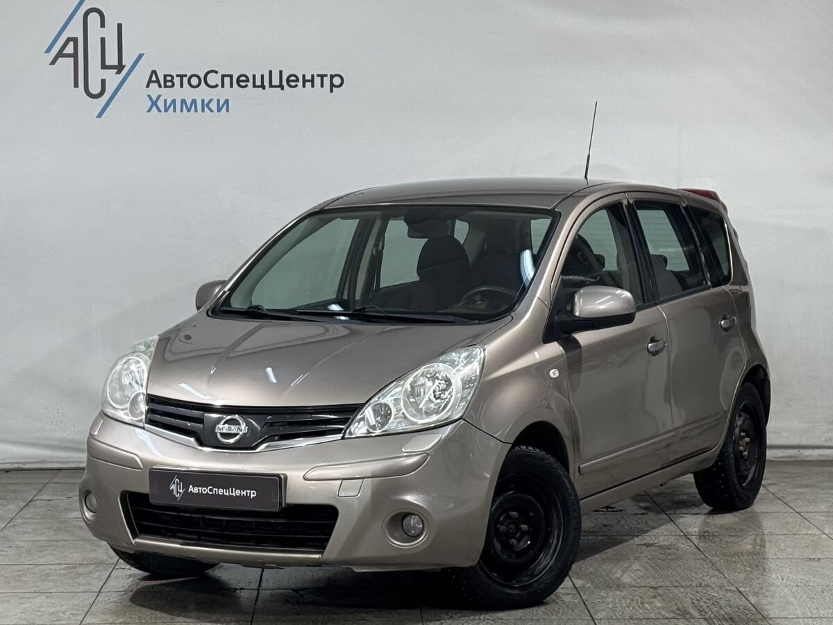 Автомобиль Nissan Note I (E11) [рестайлинг] 1.4 MT (88 л.с.) Comfort Коричневый 2011 с пробегом 136 000 км