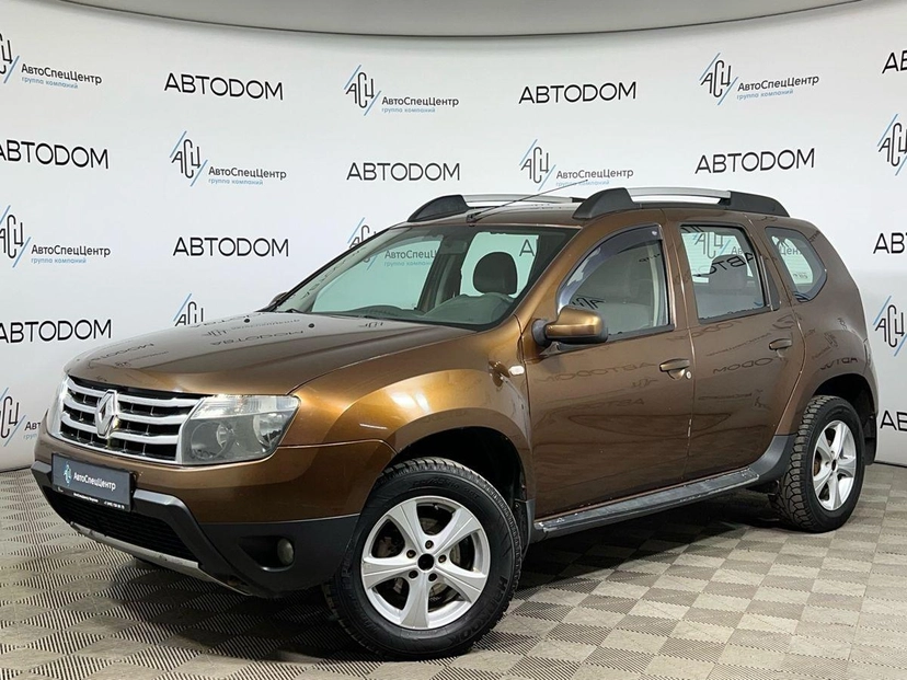 Автомобиль Renault Duster I поколение 2.0 MT 4WD (135 л.с.) Expression Коричневый 2012 с пробегом 141 000 км