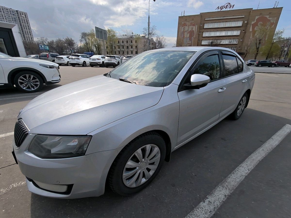 Автомобиль Skoda Octavia III поколение (A7) 1.4 AMT (140 л.с.) Elegance Серебристый 2013 с пробегом 260 133 км