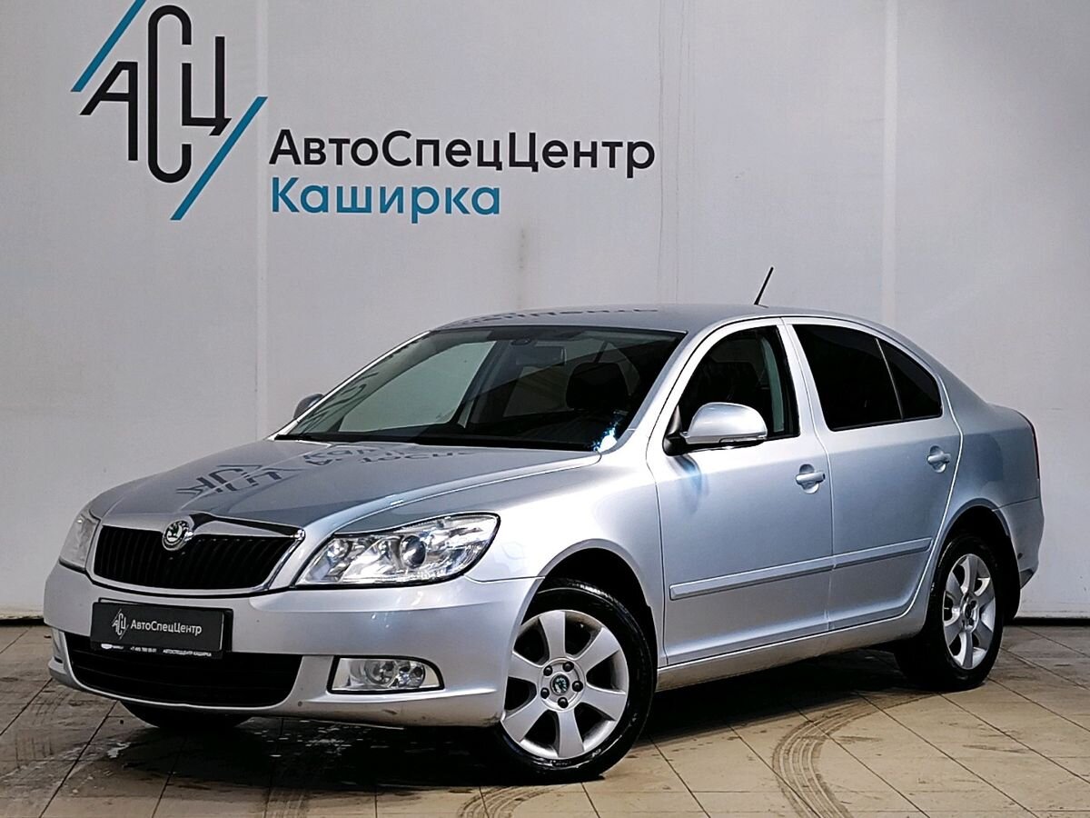 Skoda Octavia II (A5) [рестайлинг] 1.6 AT (102 л.с.) Elegance Серебристый 2013 с пробегом 221 696 км