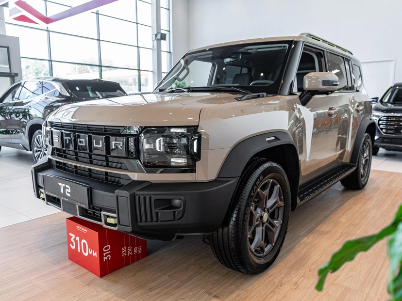 Автомобиль Jetour T2 I поколение 2.0 AMT 4WD (245 л.с.) Expedition Коричневый 2024 новый