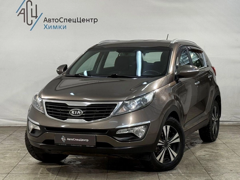 Автомобиль Kia Sportage III поколение 2.0 AT (150 л.с.) Comfort Коричневый 2013 с пробегом 134 000 км