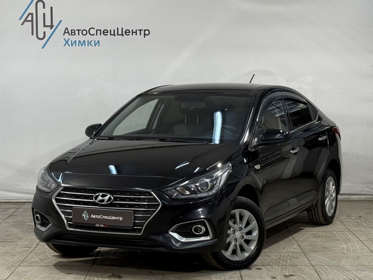 Автомобиль Hyundai Solaris II поколение 1.6 AT (123 л.с.) Elegance Чёрный 2019 с пробегом 159 000 км