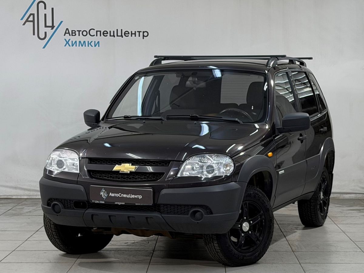 Chevrolet Niva I [рестайлинг] 1.7 MT 4WD (80 л.с.) Base Чёрный 2014 с пробегом 149 000 км