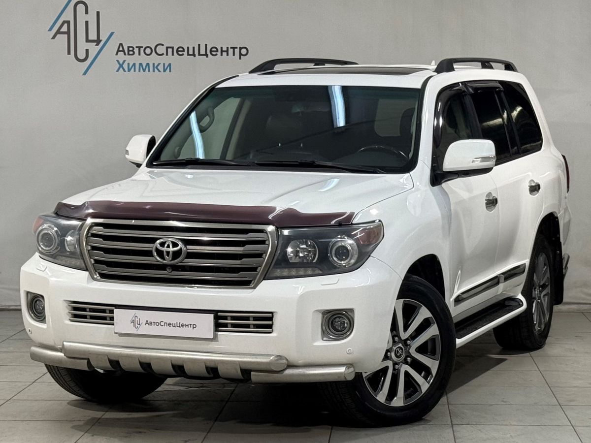 Toyota Land Cruiser IX (J200) [рестайлинг] 4.5d AT 4WD (5 мест) (235 л.с.) Элеганс Белый 2014 с пробегом 389 000 км