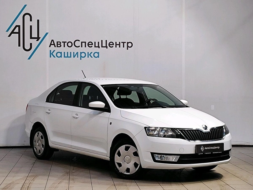 Автомобиль Skoda Rapid I поколение 1.4 AMT (125 л.с.) Ambition Белый 2016 с пробегом 82 618 км