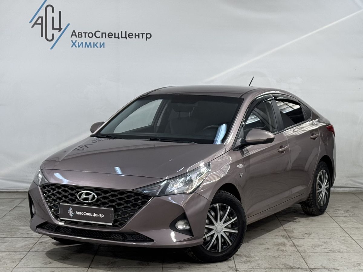 Автомобиль Hyundai Solaris II [рестайлинг] 1.6 AT (123 л.с.) Comfort Коричневый 2021 с пробегом 170 000 км