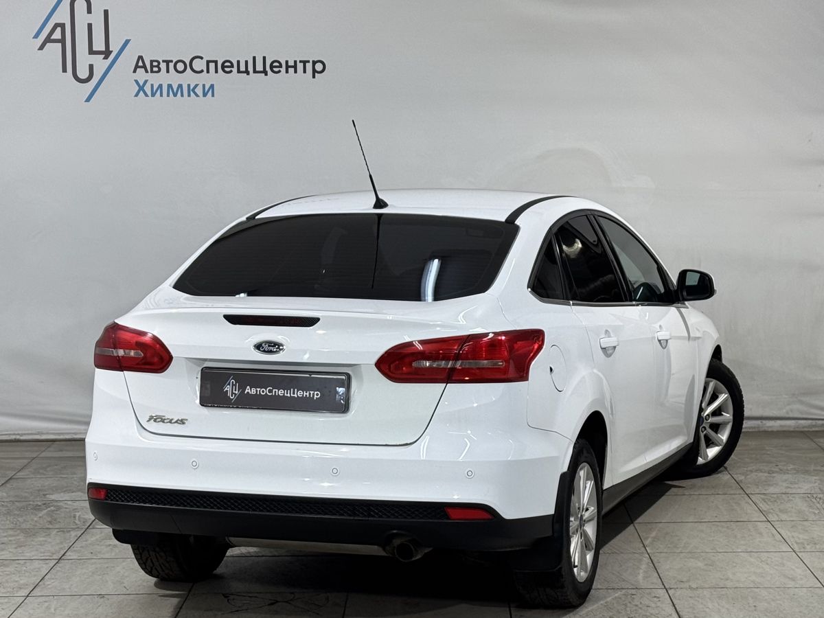 Автомобиль Ford Focus III [рестайлинг] 1.5 AT (150 л.с.) Titanium Белый 2015 с пробегом 178 000 км