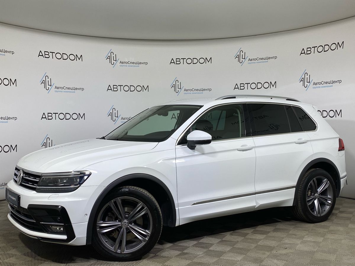 Volkswagen Tiguan II поколение 2.0 AMT 4WD (220 л.с.) Sportline Белый 2018 с пробегом 61 376 км