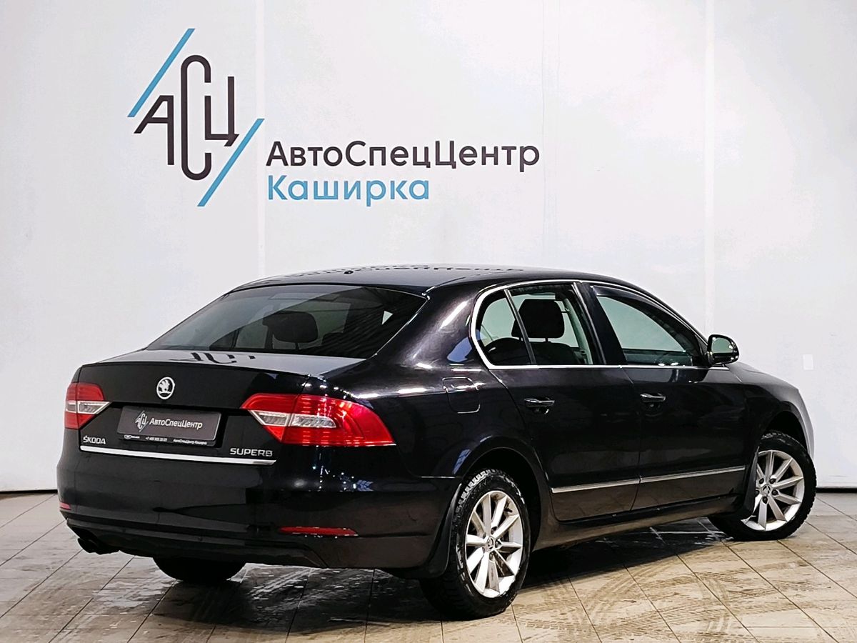 Автомобиль Skoda Superb II [рестайлинг] 1.8 AMT (152 л.с.) Ambition Чёрный 2014 с пробегом 142 216 км