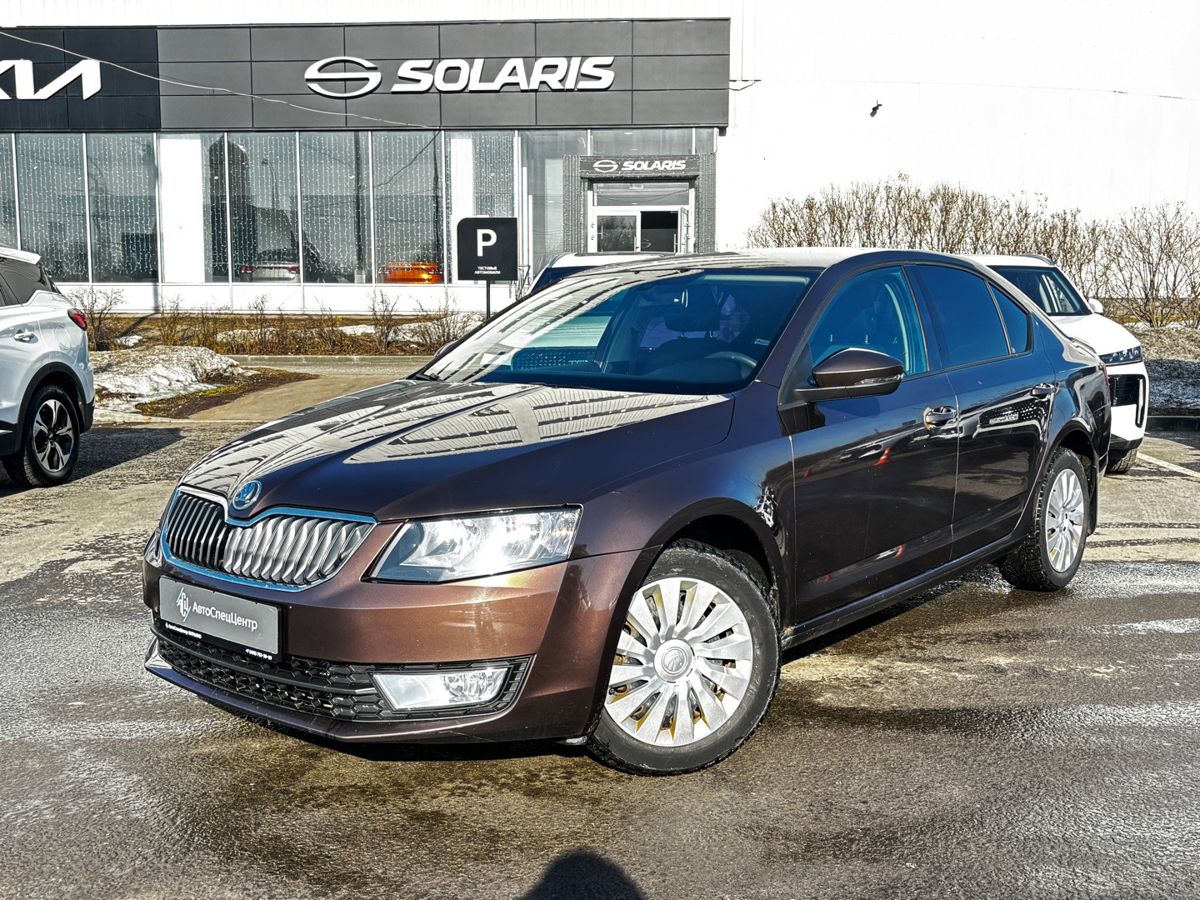 Автомобиль Skoda Octavia III поколение (A7) 1.2 MT (105 л.с.) Base Коричневый 2014 с пробегом 98 500 км