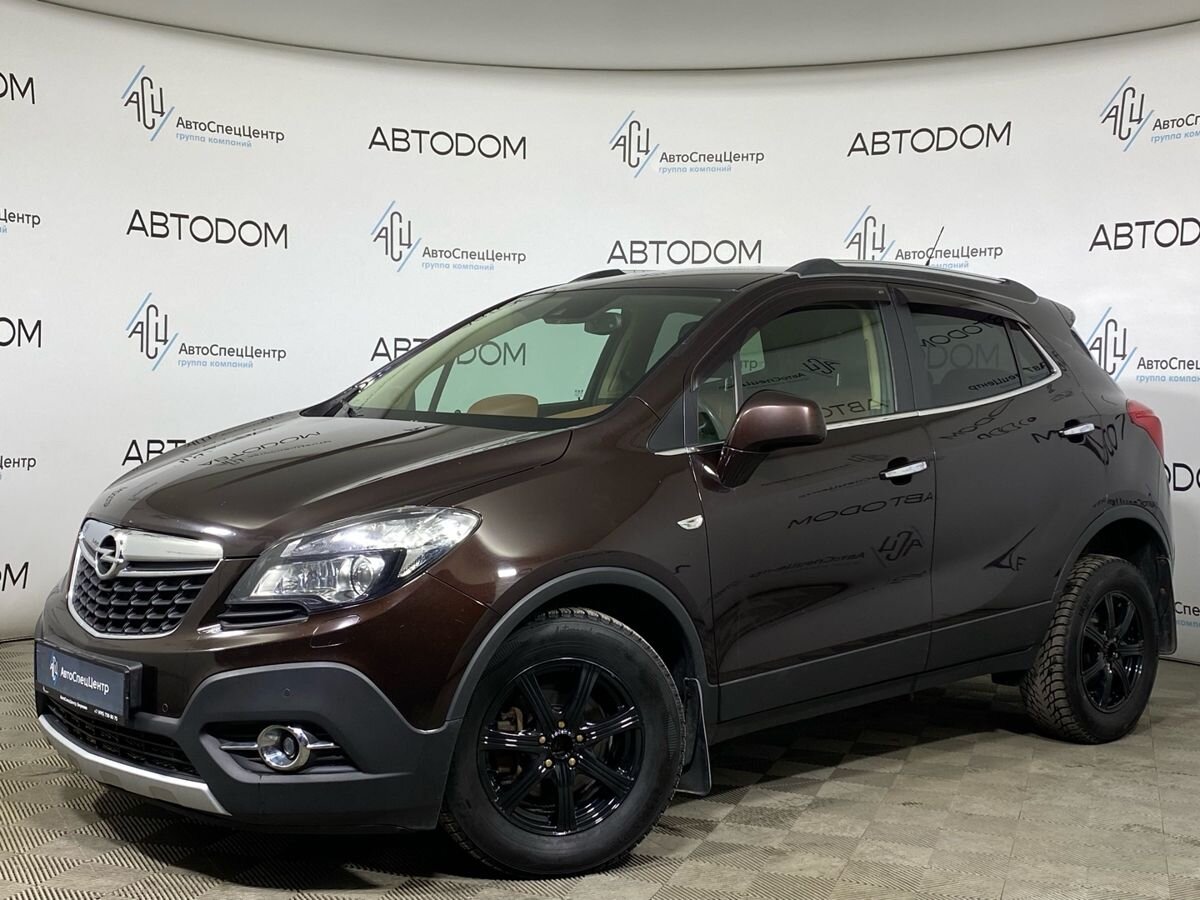 Автомобиль Opel Mokka I поколение 1.8 AT 4WD (140 л.с.) Cosmo Коричневый 2013 с пробегом 132 576 км