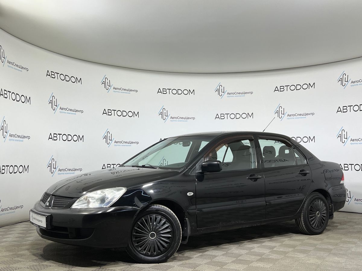 Mitsubishi Lancer IX [рестайлинг] 1.6 AT (98 л.с.) Base Чёрный 2007 с пробегом 219 036 км