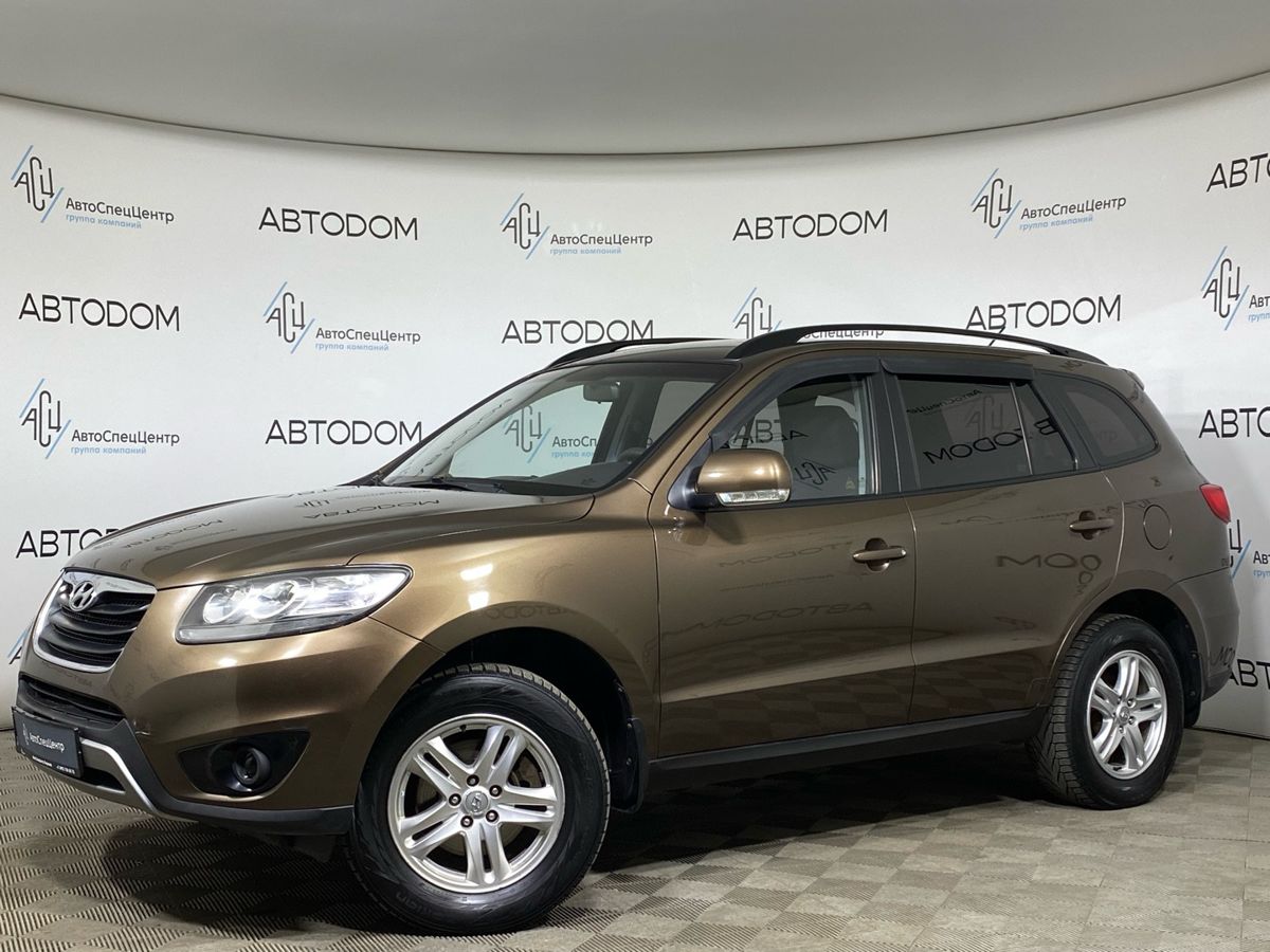 Hyundai Santa Fe II (CM) [рестайлинг] 2.4 AT 4WD (174 л.с.) Base Коричневый 2011 с пробегом 155 250 км