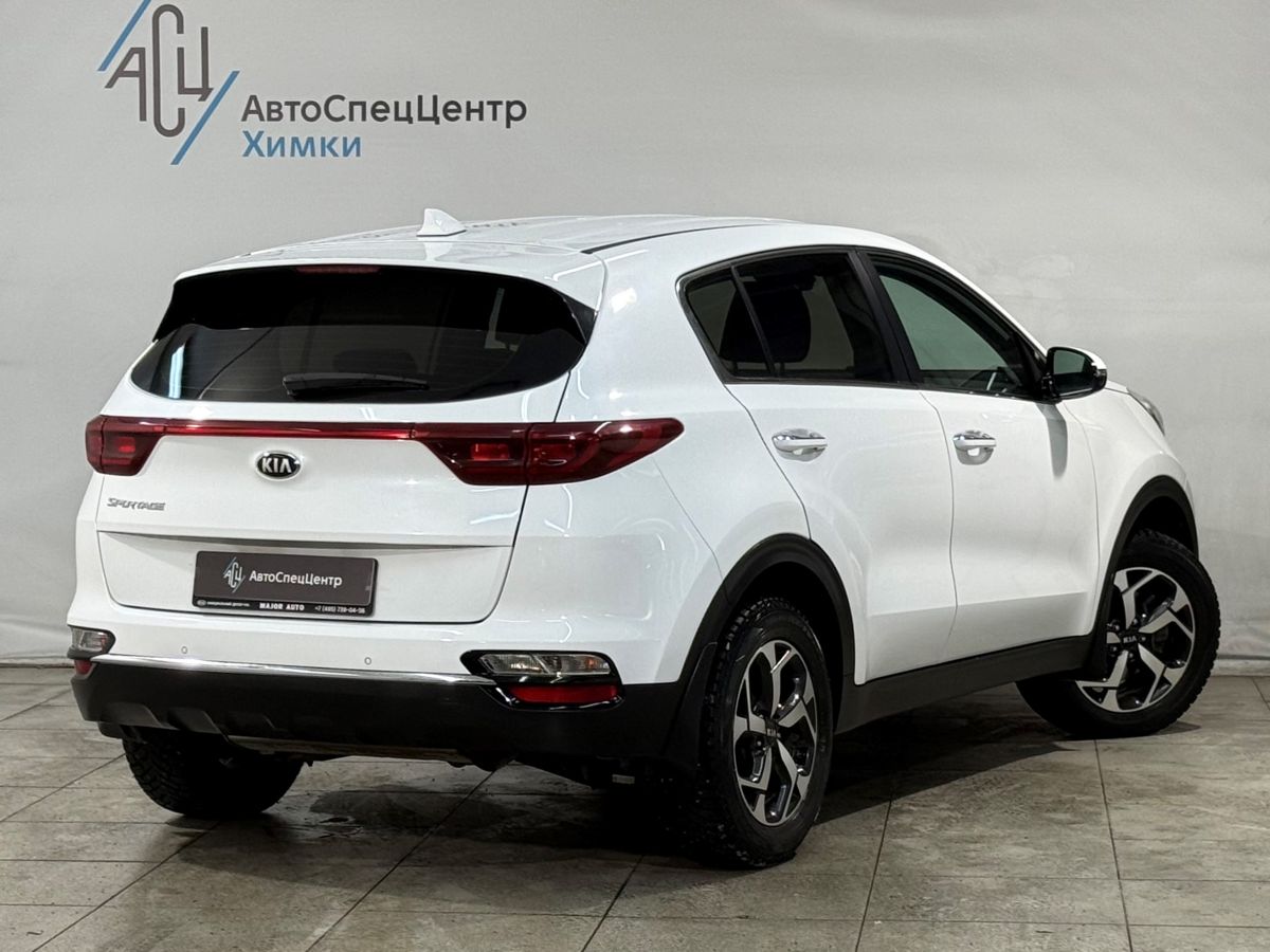 Автомобиль Kia Sportage IV [рестайлинг] 2.0 AT (150 л.с.) Comfort Белый 2019 с пробегом 65 000 км