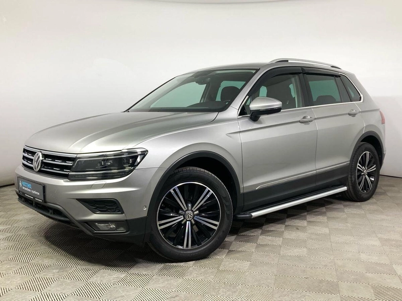 Автомобиль Volkswagen Tiguan II поколение 2.0 AMT 4WD (220 л.с.) Highline Серебристый 2017 с пробегом 87 000 км