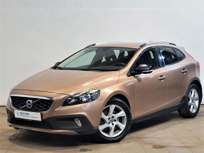Автомобиль Volvo V40 II поколение 2.0 AT (180 л.с.) Base Коричневый 2014 с пробегом 130 000 км