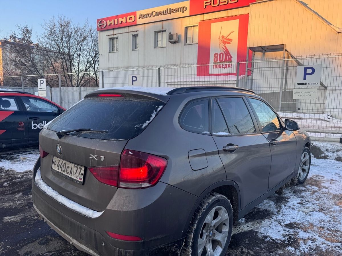Автомобиль BMW X1 I (E84) [рестайлинг] 2.0d AT 4WD (184 л.с.) Base Коричневый 2013 с пробегом 217 467 км