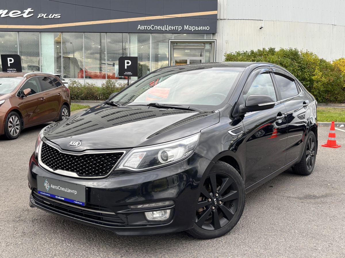 Kia Rio III [рестайлинг] 1.6 AT (123 л.с.) Premium Чёрный 2015 с пробегом 170 000 км