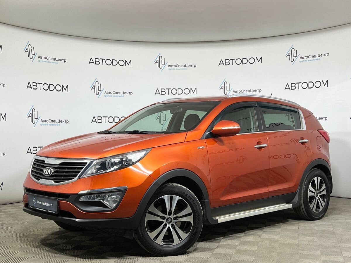 Kia Sportage III поколение 2.0 AT 4WD (150 л.с.) Prestige Красный 2013 с пробегом 158 660 км