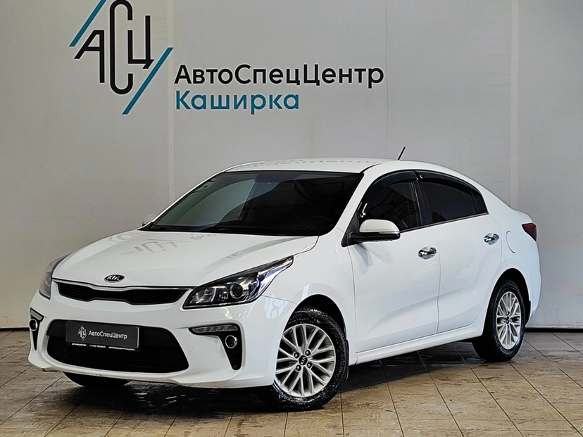 Автомобиль Kia Rio IV поколение 1.6 AT (123 л.с.) Prestige Белый 2018 с пробегом 157 600 км