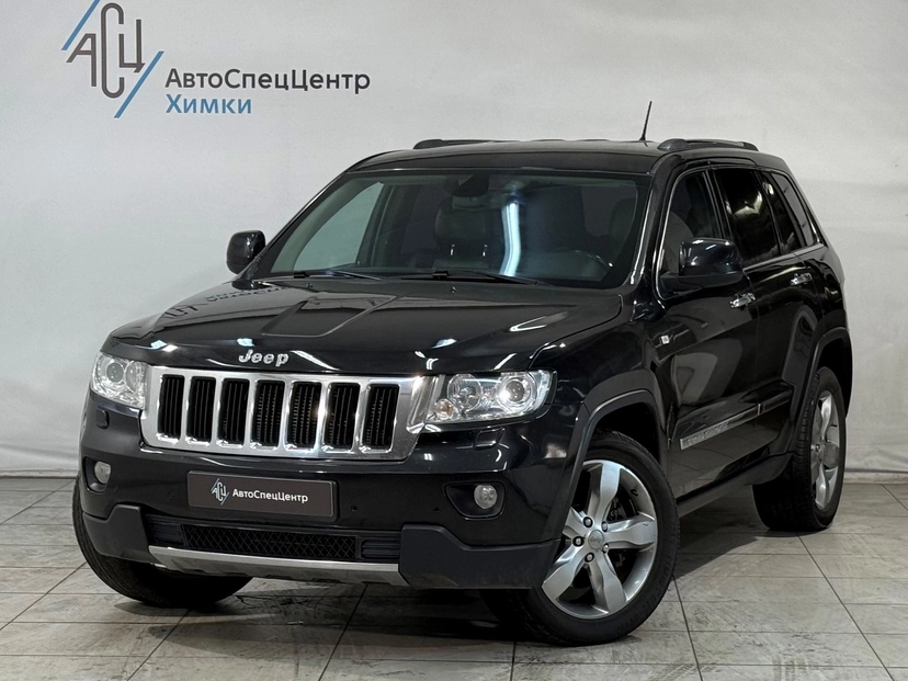 Автомобиль Jeep Grand Cherokee IV поколение (WK2) 3.6 AT 4WD (286 л.с.) Limited Чёрный 2012 с пробегом 261 000 км